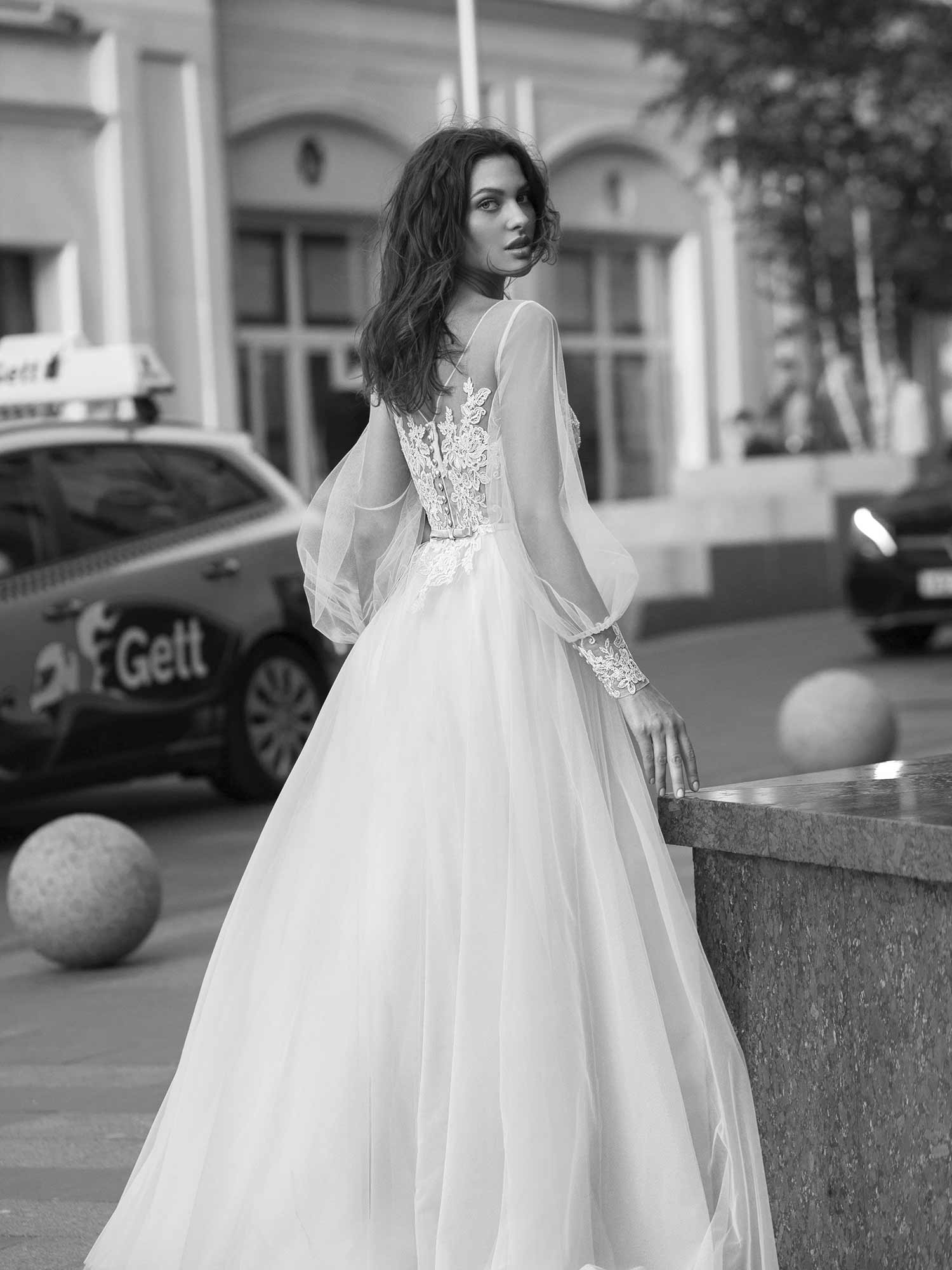 Bishop sleeve A-line wedding dress with illusion neckline and lace  detailing on the bodice