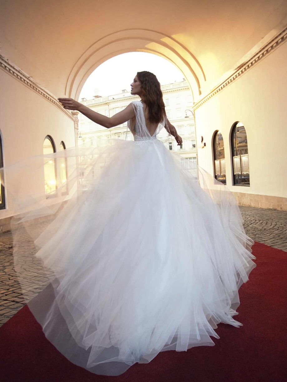 lace bodice and beading hanging from the shoulders