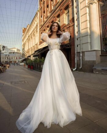 A-line wedding gown with an off-the-shoulder neckline