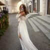 Chiffon wedding dress with off-the-shoulder bishop sleeves and high leg slit
