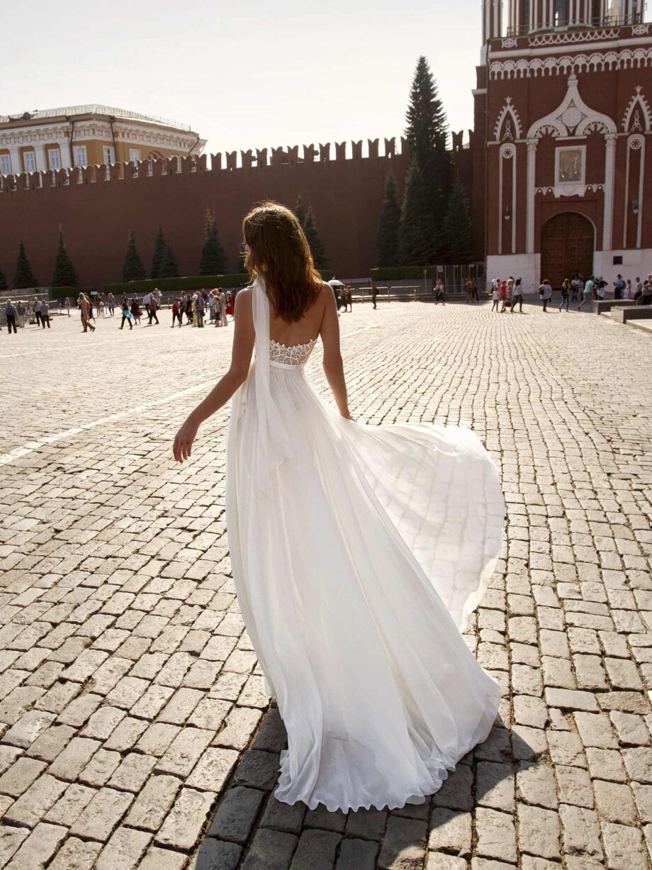 Two-piece wedding dress with sequinned shorts and chiffon overlay