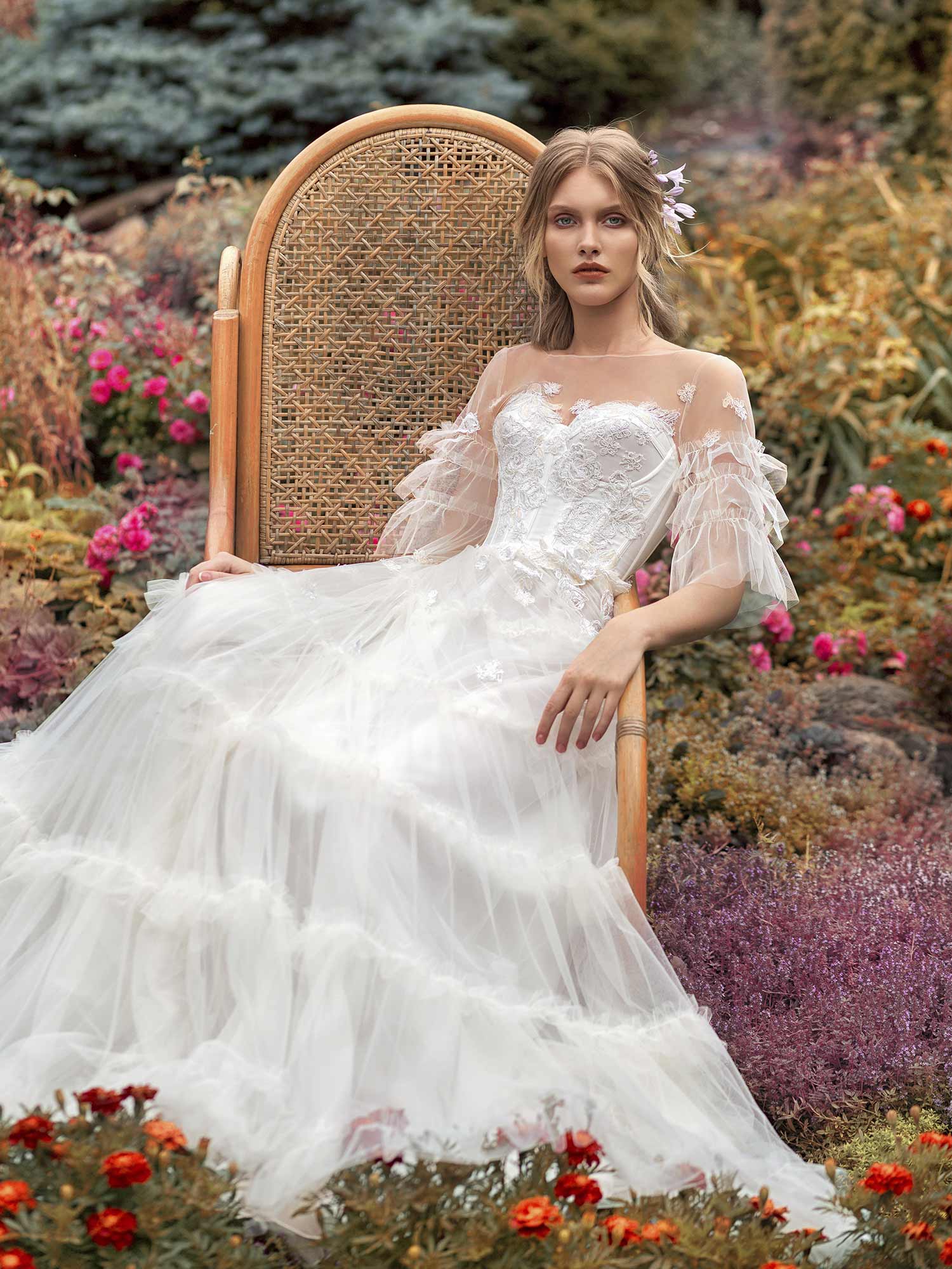 A-line wedding gown with ruffled sleeves and bustier bodice