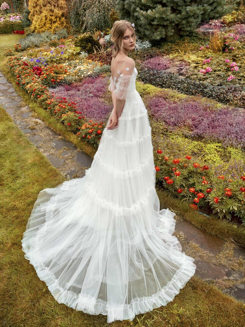 A-line wedding gown with ruffled sleeves and bustier bodice