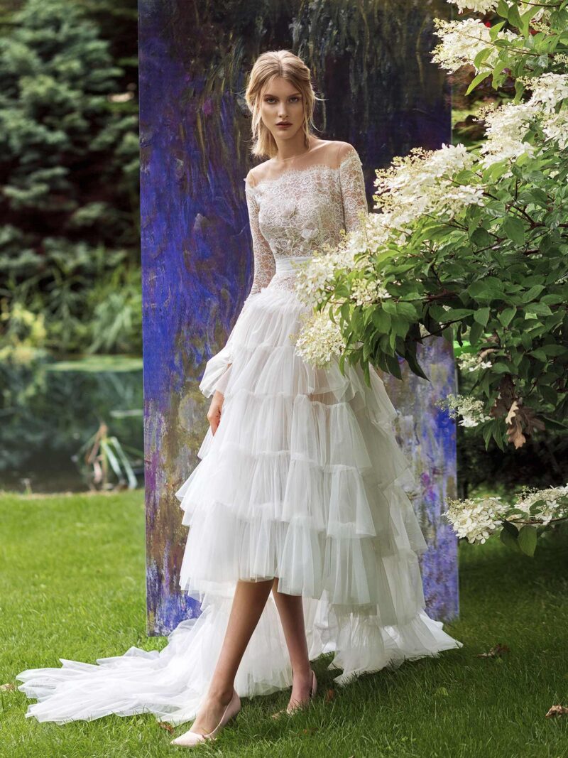 High-low wedding dress with layered ruffled skirt