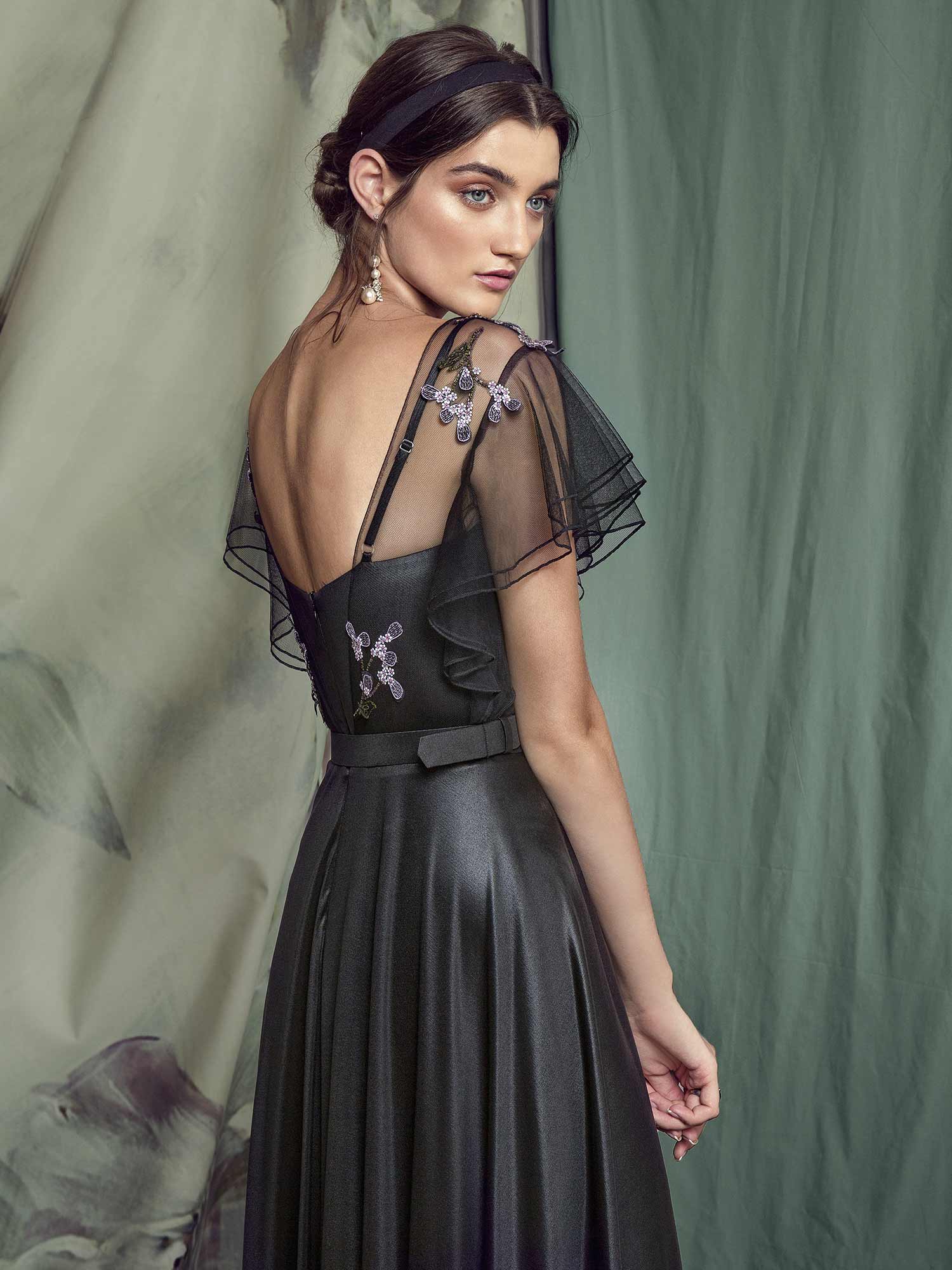 Luxury formal dress with asymmetrical designs and slit on the leg