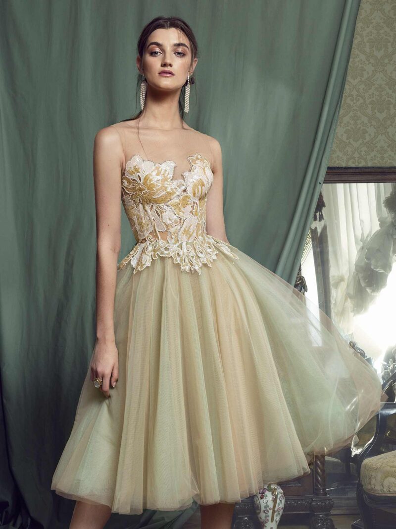 Ball gown evening dress with sequinned embroidered top