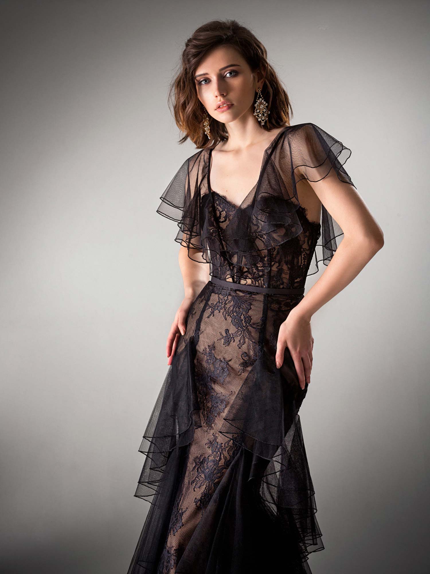 Fitted evening gown with ruffle details