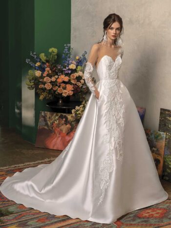 Long sleeved ball gown wedding dress with pockets