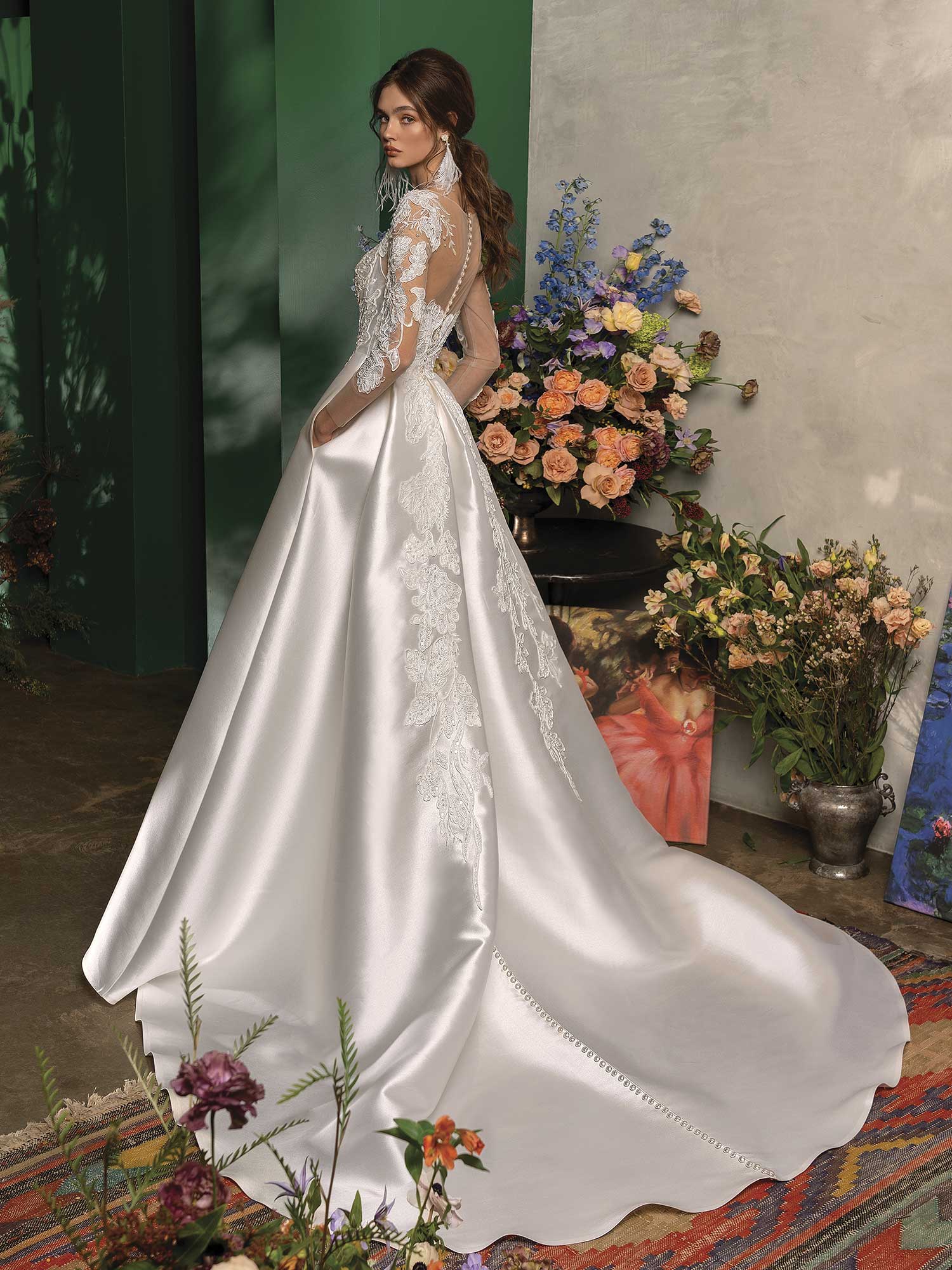 Papilio Long sleeved ball gown wedding dress with pockets