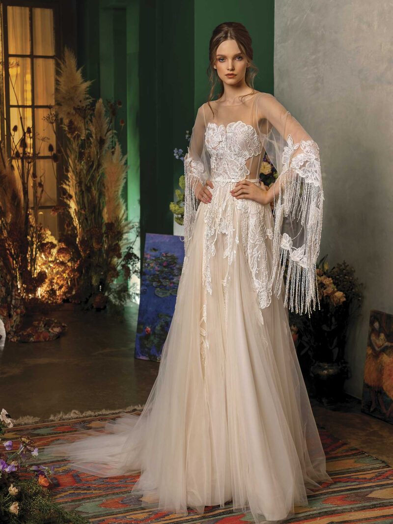 A-line wedding dress with trumpet sleeves and fringe