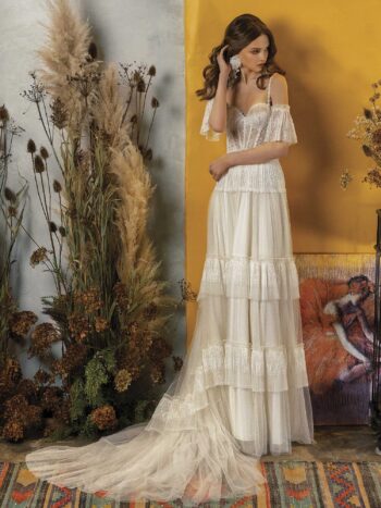 A-line wedding dress with ruffled skirt and off-the-shoulder bell sleeves