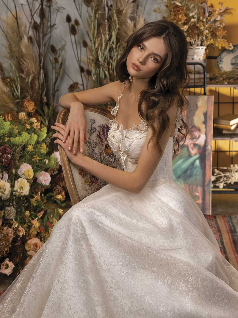 A-line wedding dress with bustier bodice and floral embroidery