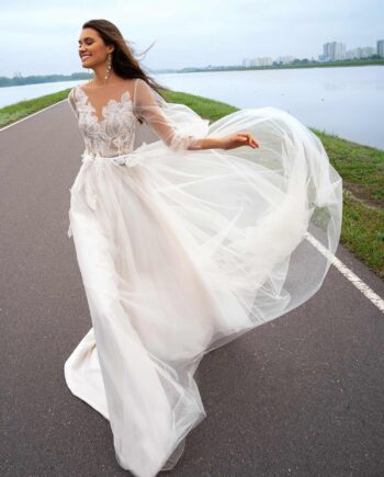 Bridal gown with bishop sleeves and embellished bodice