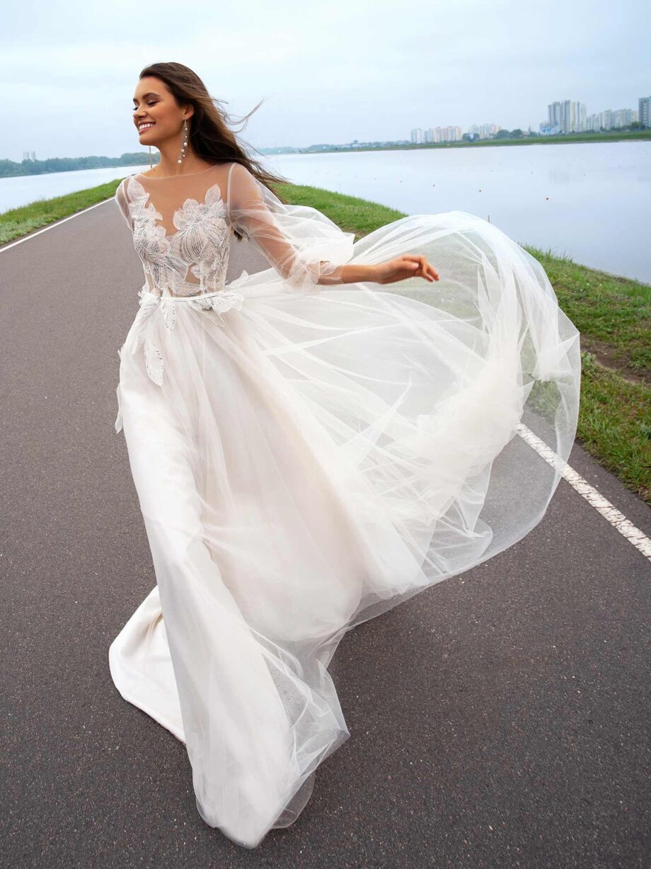 Bridal gown with bishop sleeves and embellished bodice