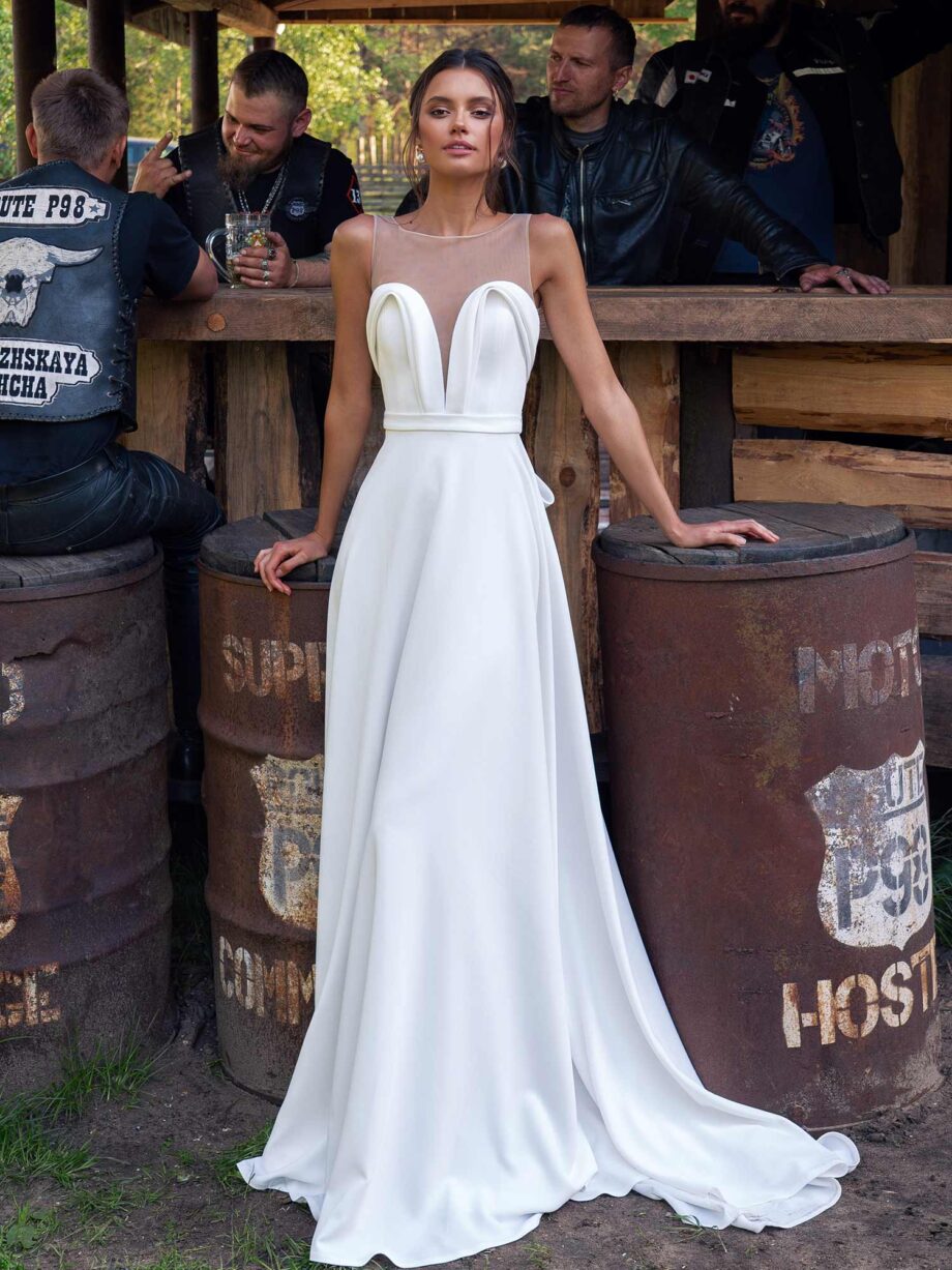 Simple wedding dress with plunging neckline