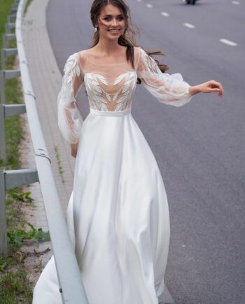 Wedding gown with embroidery and bishop sleeves