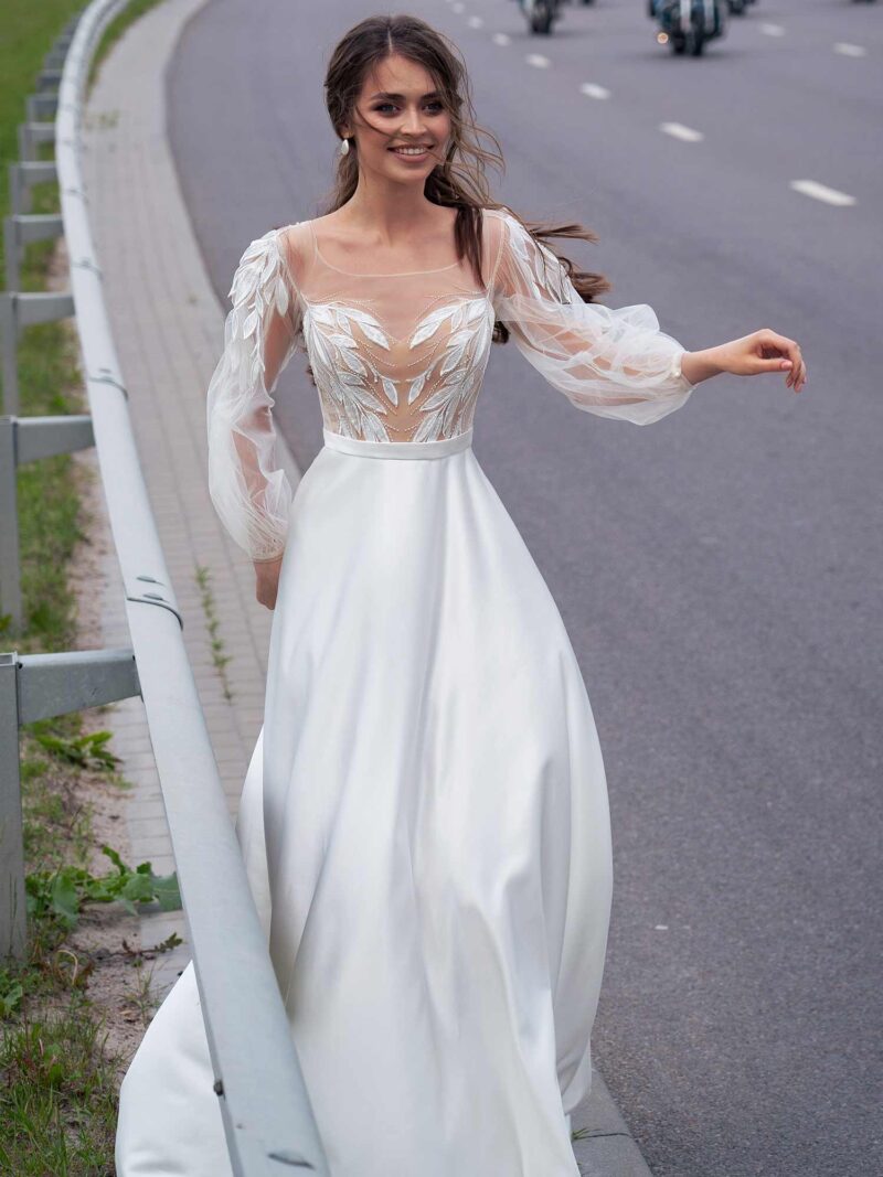 Wedding gown with embroidery and bishop sleeves