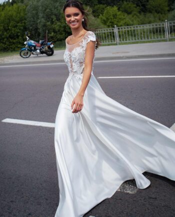 Bridal gown with cap sleeves and embroidery