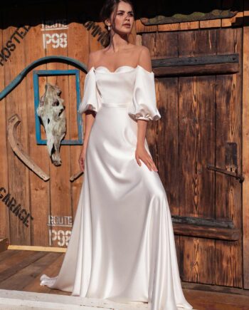 Off-the-shoulder wedding dress with bishop sleeves