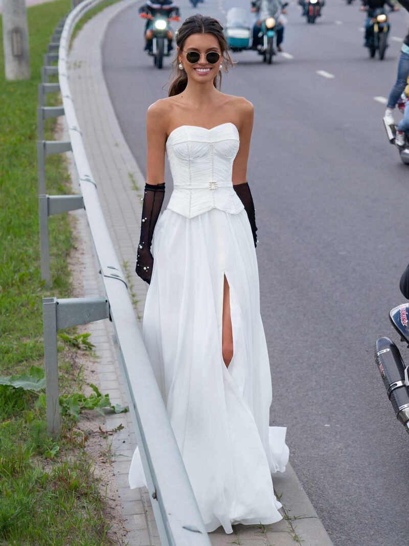 Simple wedding dress with dropped waist and pearl details