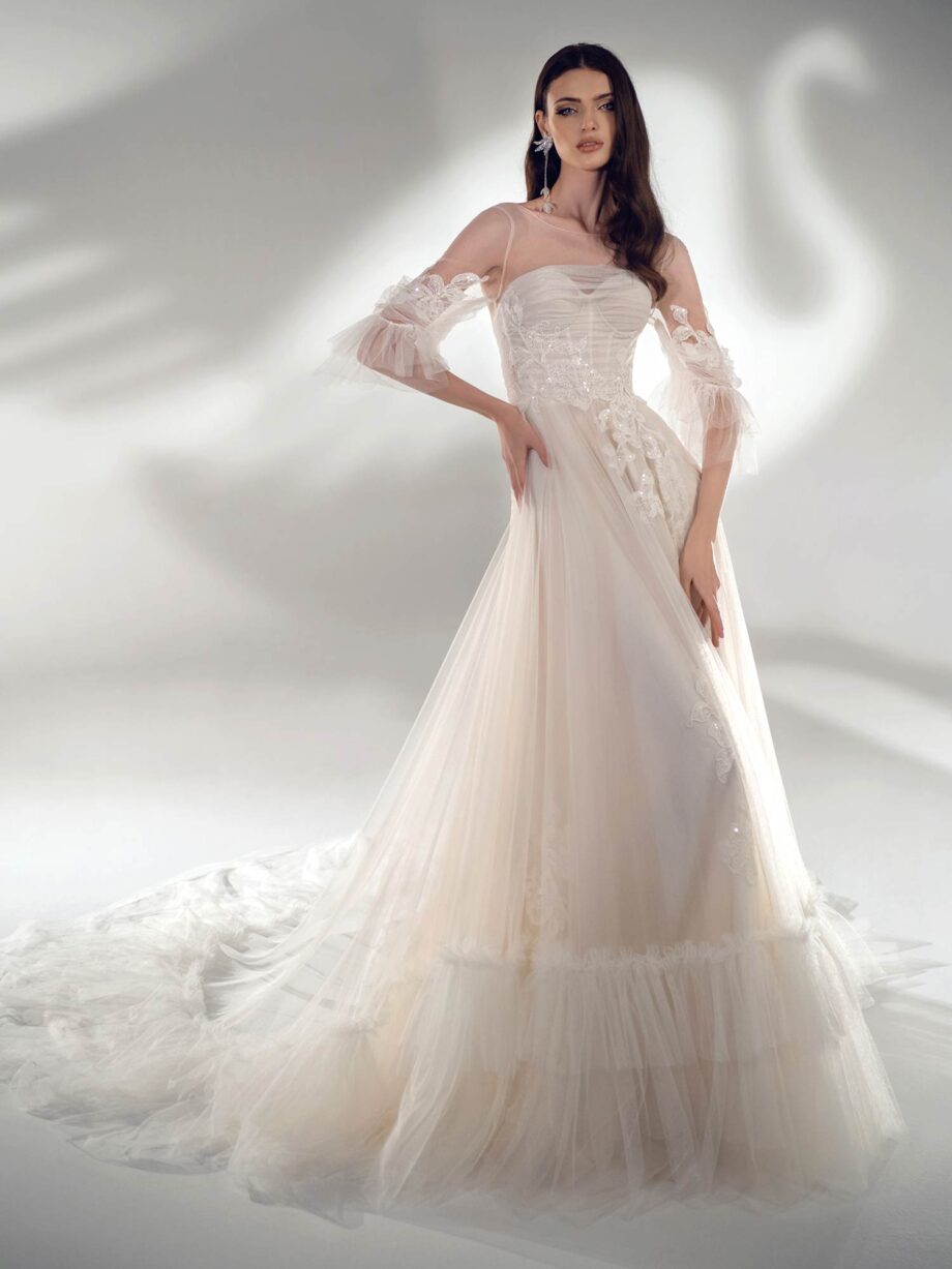 Three-quarter sleeve A-line wedding dress with ruffles