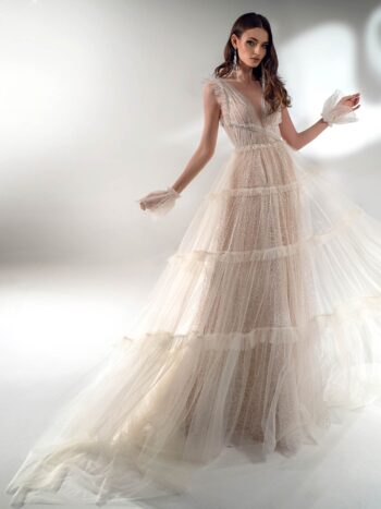 Shimmering A-line wedding dress with ruffles
