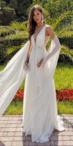 Plunging neckline chiffon wedding dress with detachable cape sleeves and open back