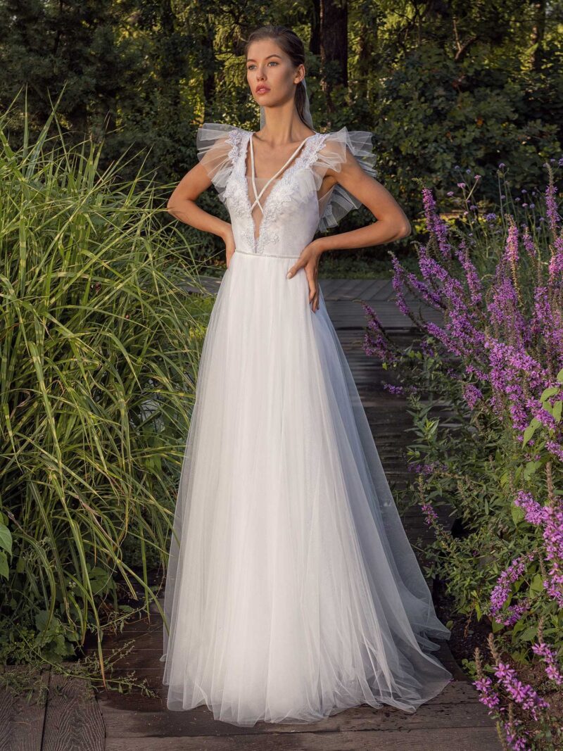 Glitter tulle A-line wedding dress with ruffled cap sleeves and open back