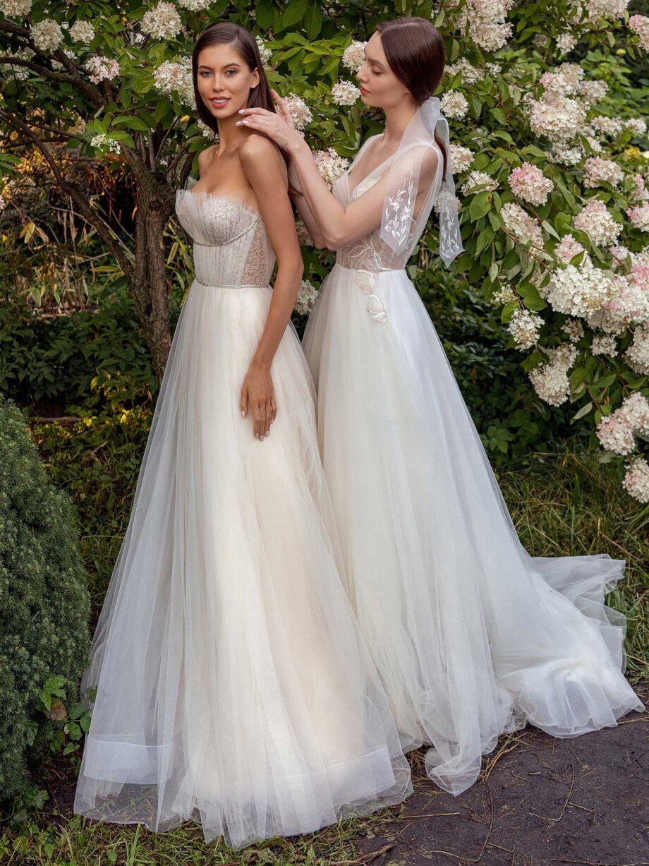 Strapless A-line wedding dress with frilled tulle neckline and sequined bodice