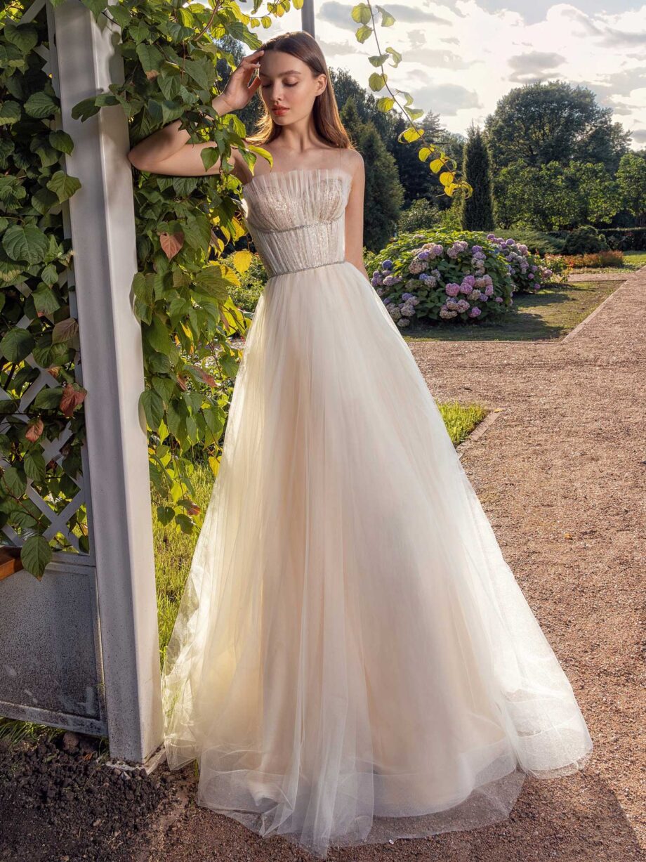 Strapless A-line wedding dress with frilled tulle neckline and sequined bodice