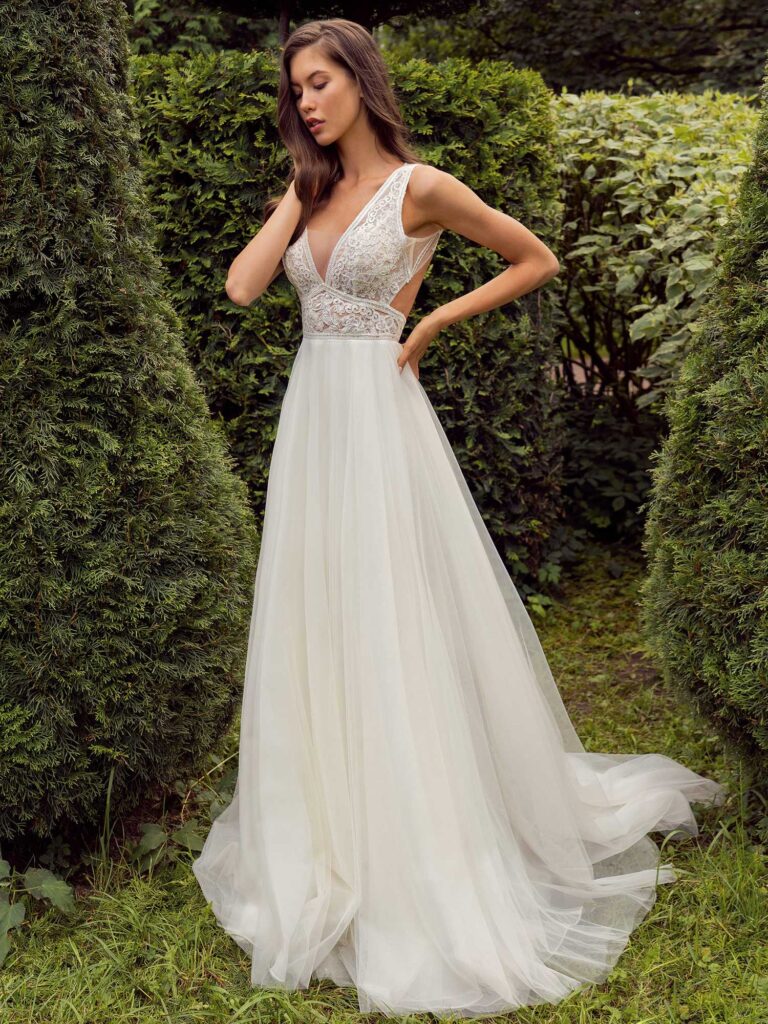 A-line wedding dress with a deep V-neckline lace bodice and tulle skirt