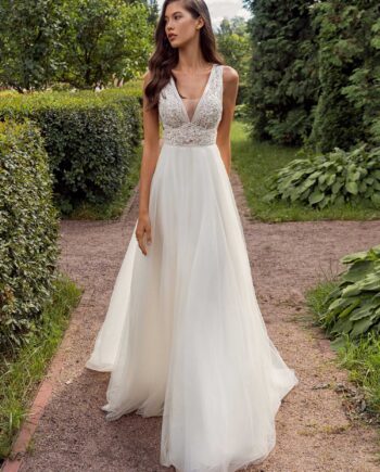 A-line wedding dress with a deep V-neckline lace bodice and tulle skirt