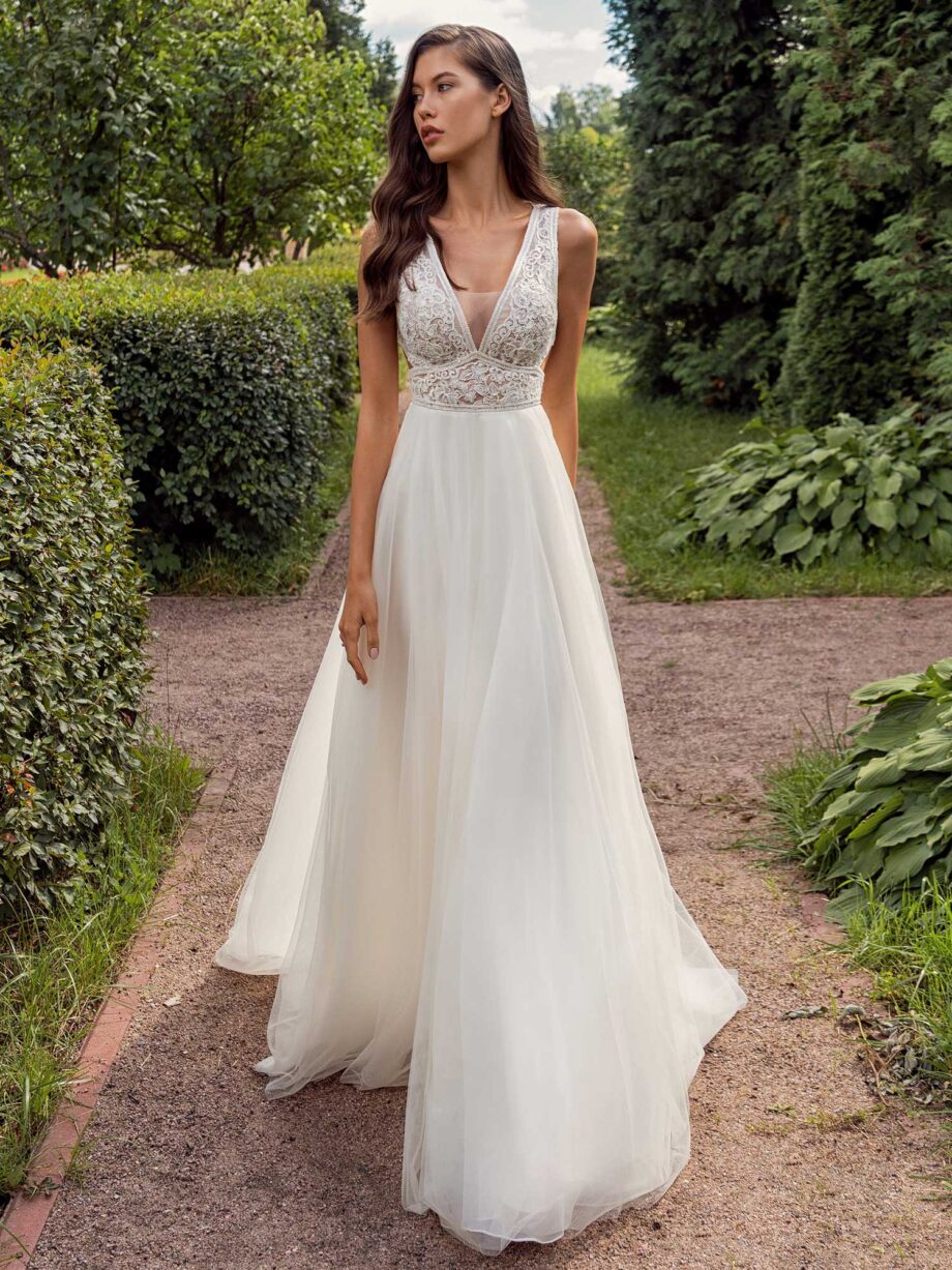 A-line wedding dress with a deep V-neckline lace bodice and tulle skirt