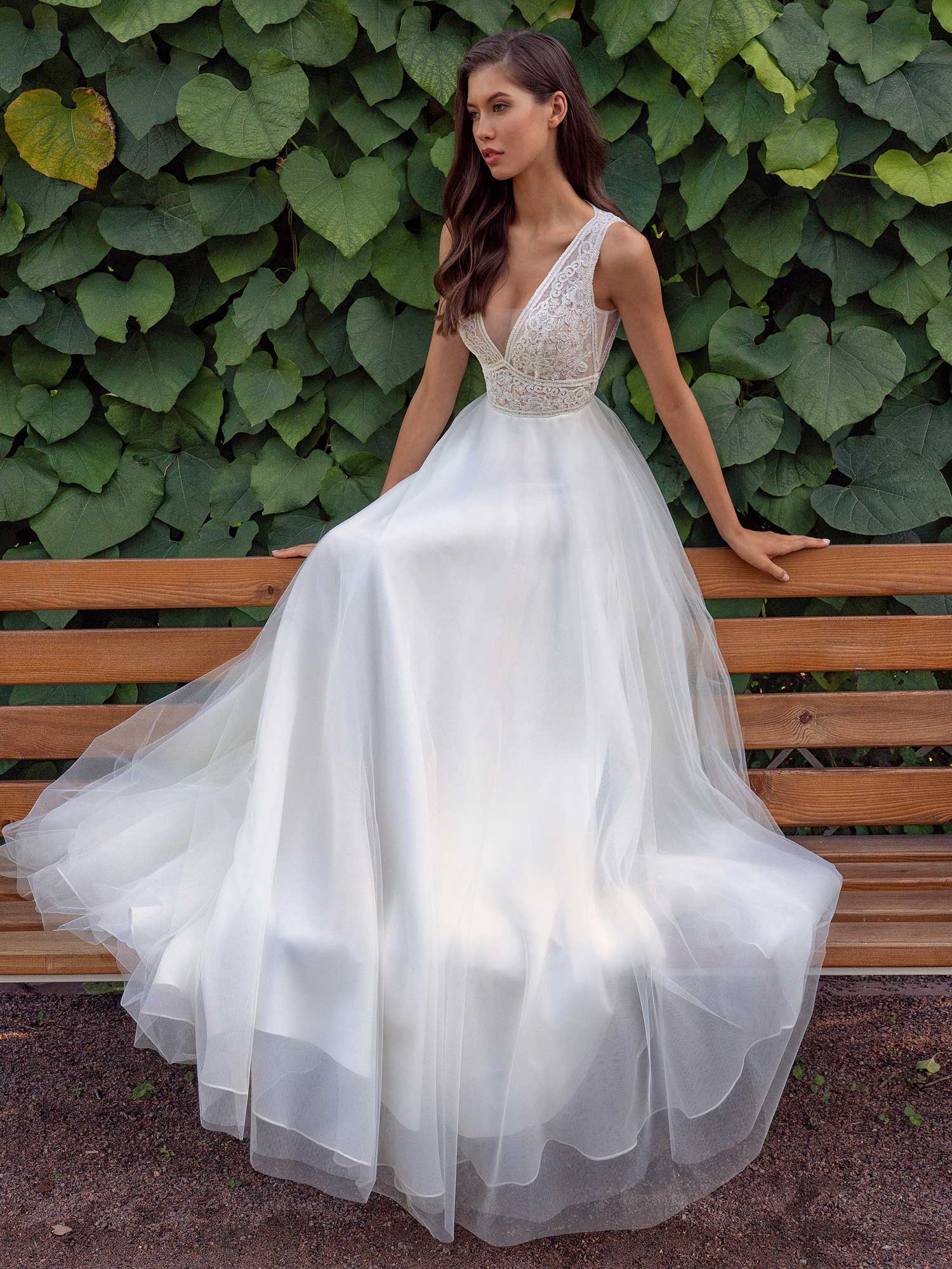 Aline wedding dress with a deep Vneckline lace bodice
