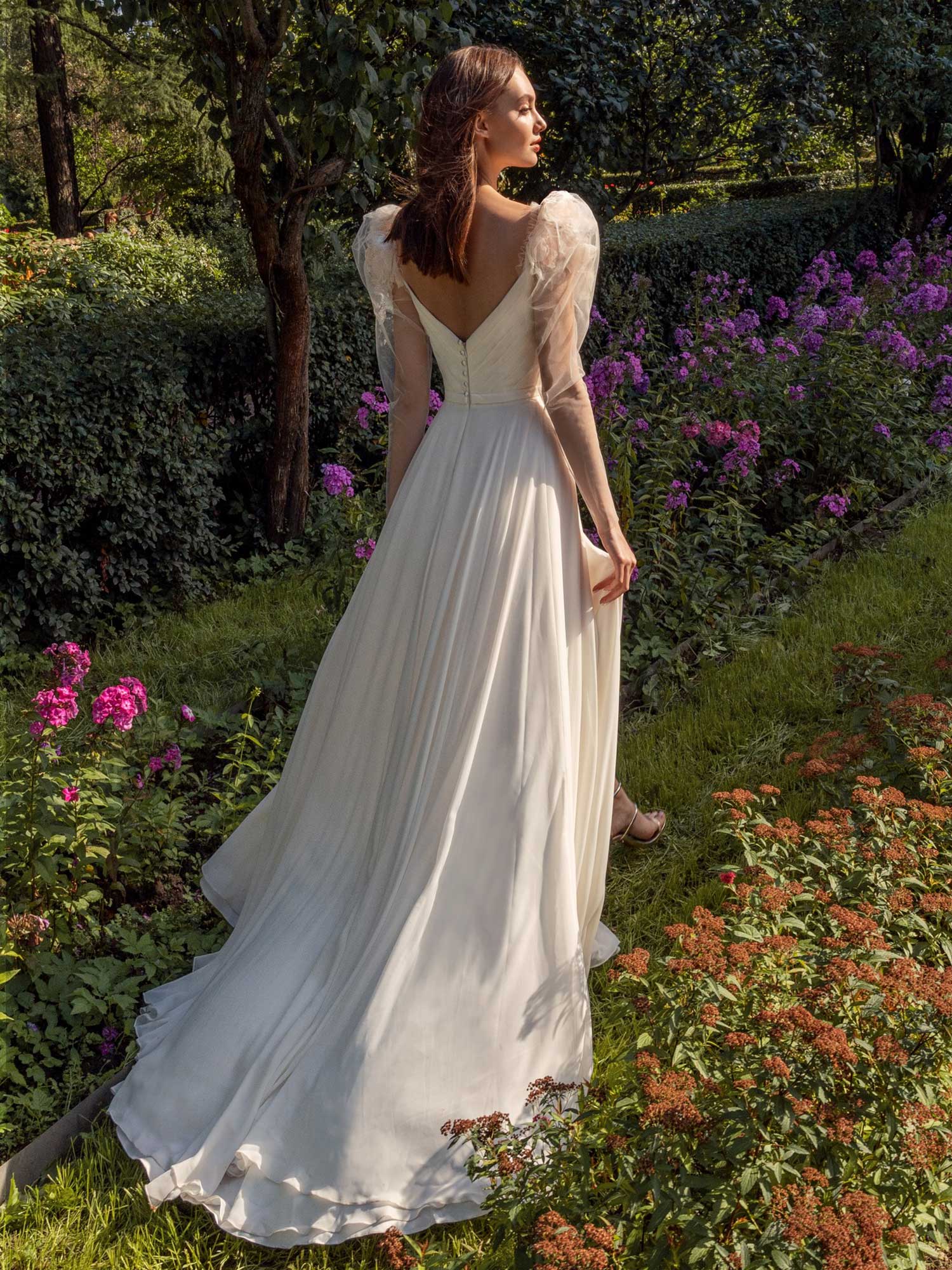 Long-sleeve sheath wedding dress with extended shoulders