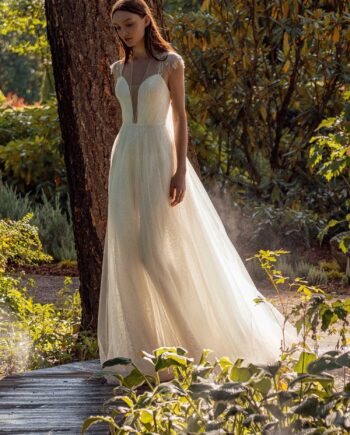 Shimmering lace A-line wedding dress with beaded shoulders