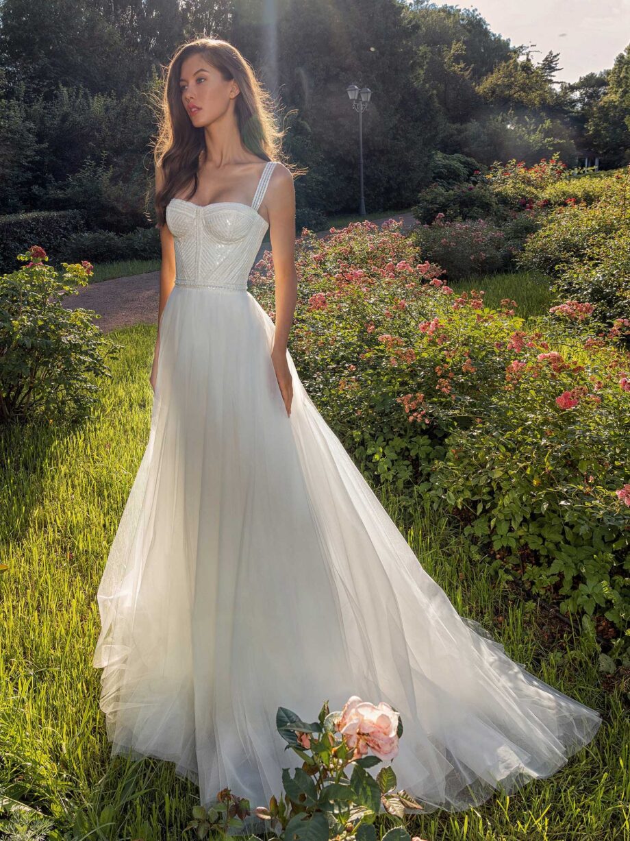 Bustier style A-line wedding dress with pearl waistline