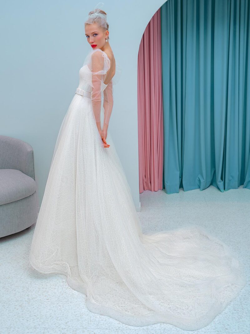 A-line wedding dress with plunging neckline and long sleeves