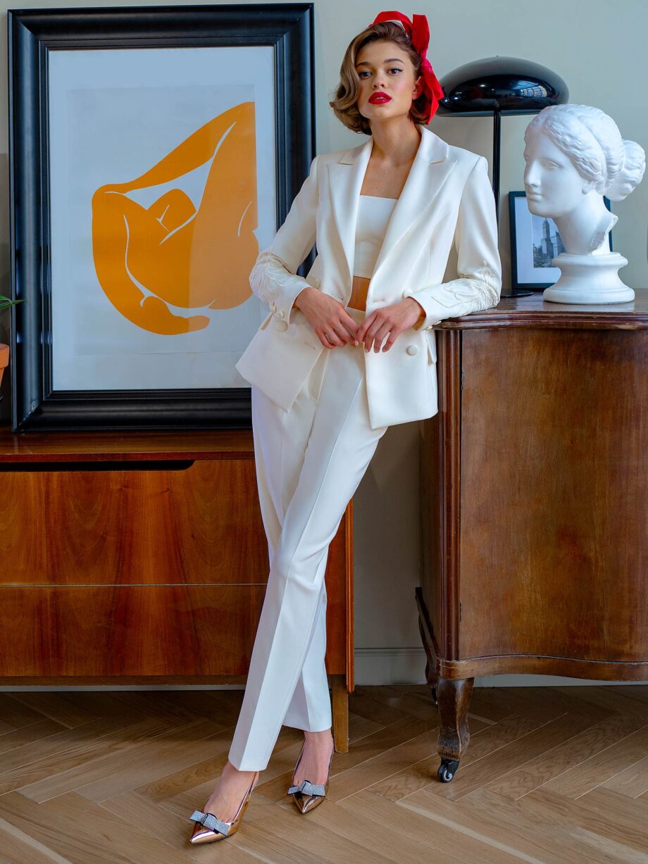 Three-piece bridal pantsuit with top and jacket