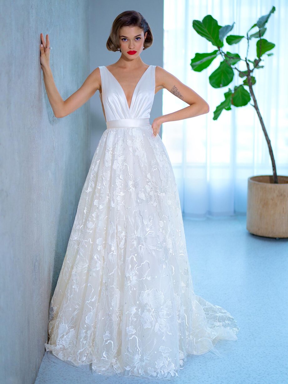 Ball gown wedding dress with floral lace skirt and atlas top