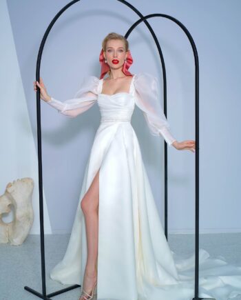 A-line wedding dress with bishop sleeves and high slit skirt