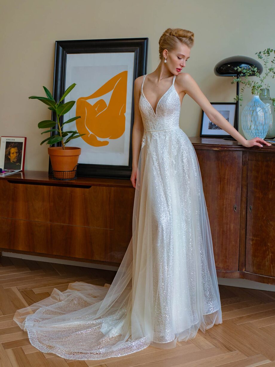 Sparkling A-line wedding dress with spaghetti straps