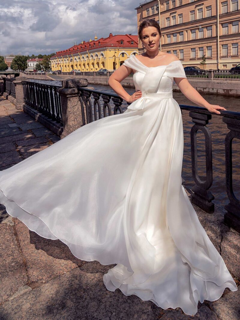 Simple plus size A-line wedding dress with off the shoulder neckline