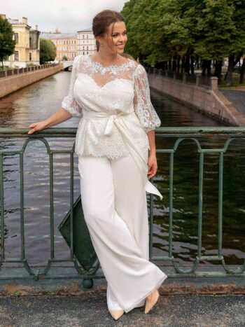 Plus size bridal set with 3/4 sleeve lace top and knee-length skirt