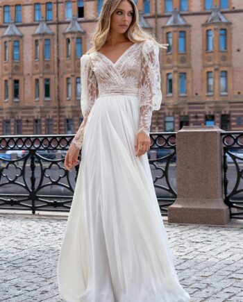 Long sleeve wedding dress with a flowy skirt