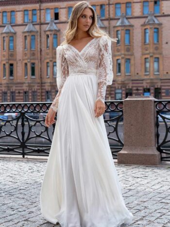 Long sleeve wedding dress with a flowy skirt