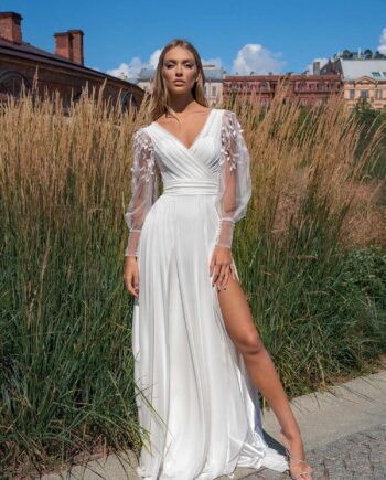 A-line wedding dress with long sleeves and skirt slit