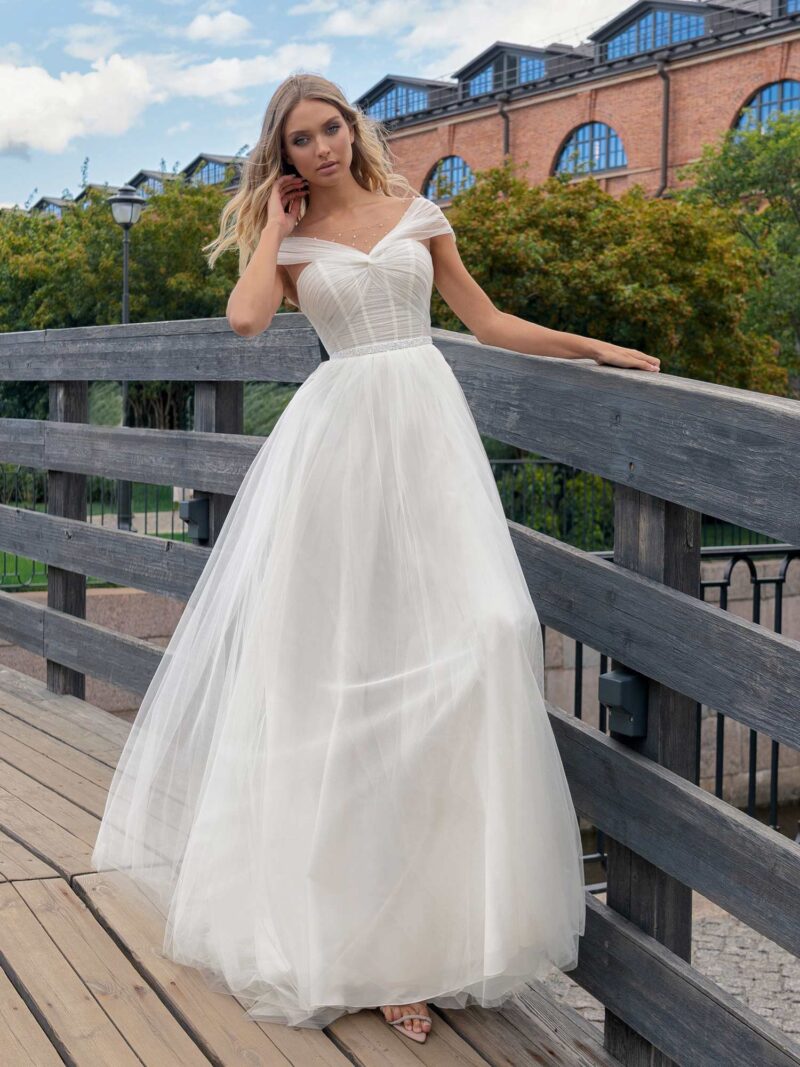 Ballgown wedding dress with off-the-shoulder sleeves