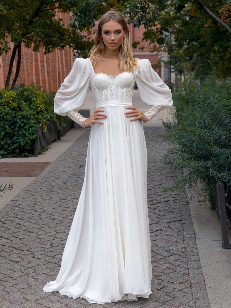 Long-sleeve sheath wedding dress with bustier style corset