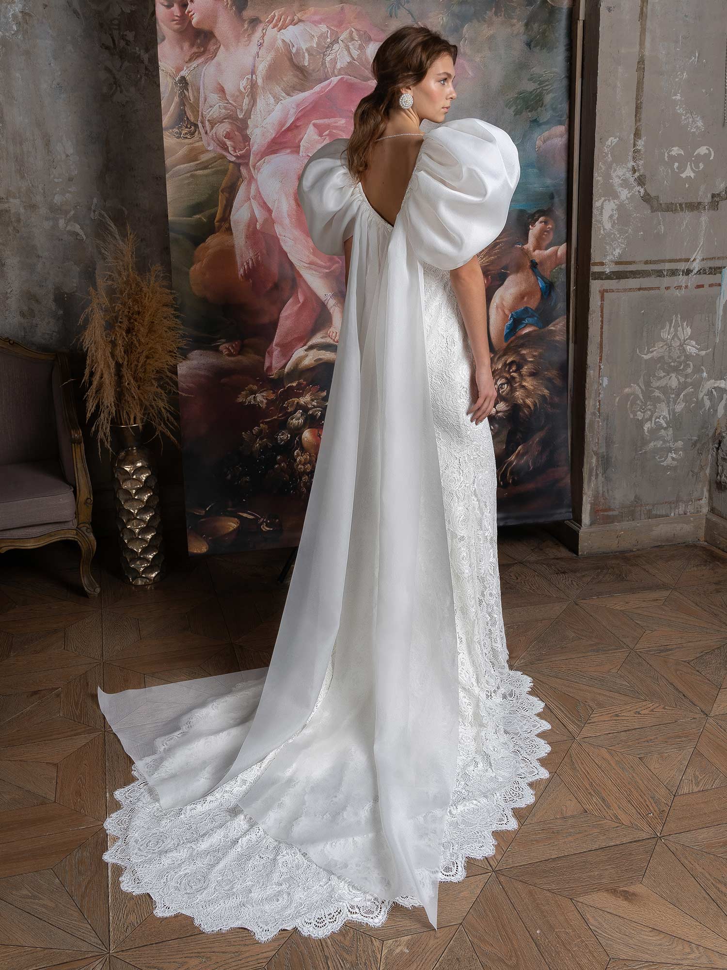 Fit and flare wedding dress with oversized sleeves